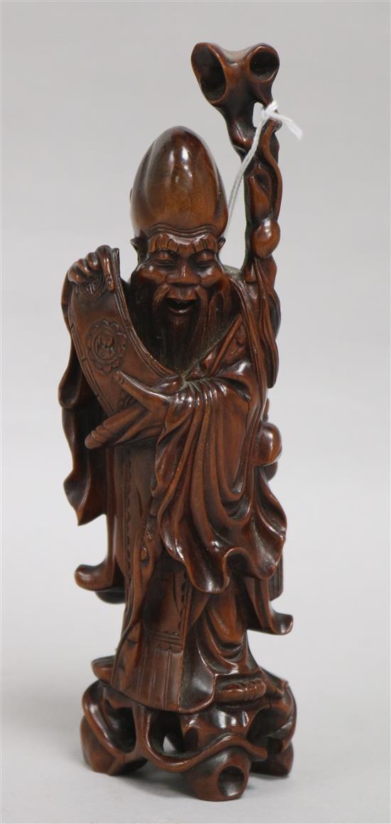 A Chinese boxwood figure of an immortal
